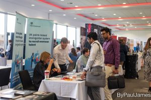 Home-Office-stand-visitors-exhibitors-chatting- Manchester-Biz-Fair-2022