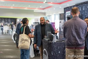 Studio-Vega-Myst-talking-visitors-Manchester-Biz-Fair-2022-exhibition-space